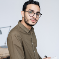 young-businessman-in-casualwear-and-eyeglasses-loo-JB4ZZET.png
